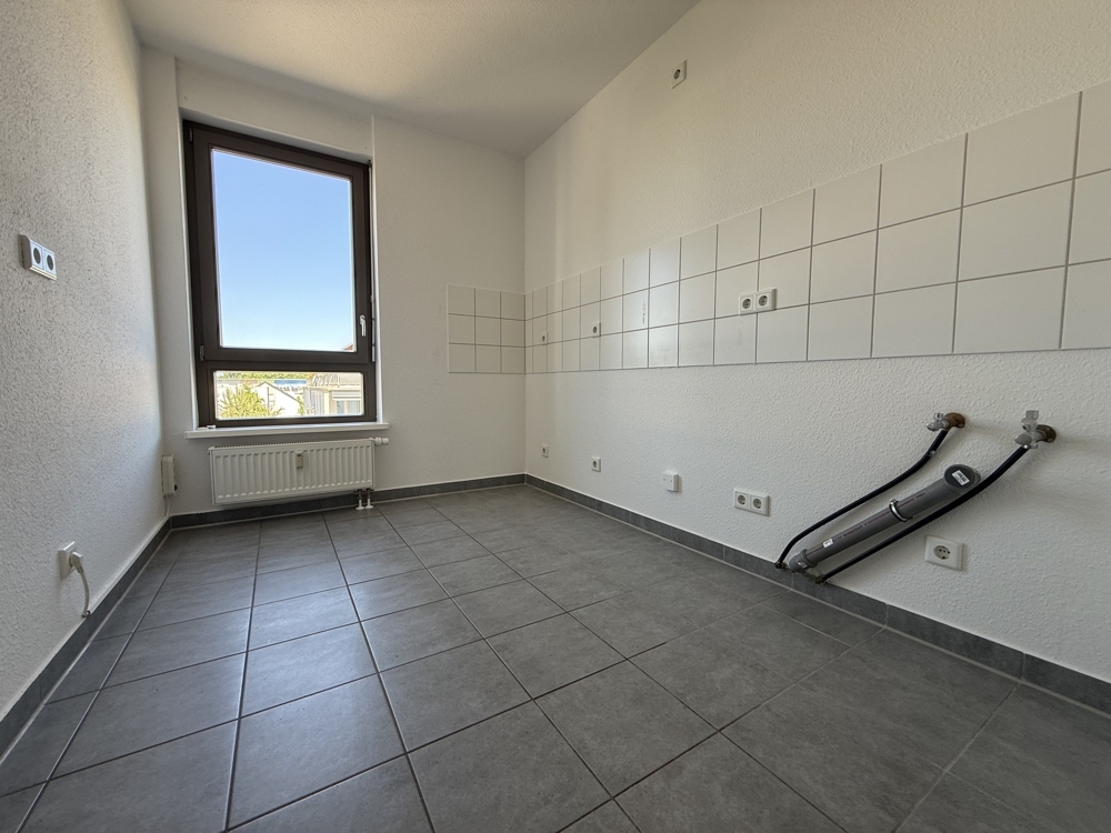 Sonnenhelle 2 Zi.-Wohnung mit Tageslichtbad plus Stellplatz mit Wallbox! - Photo 2