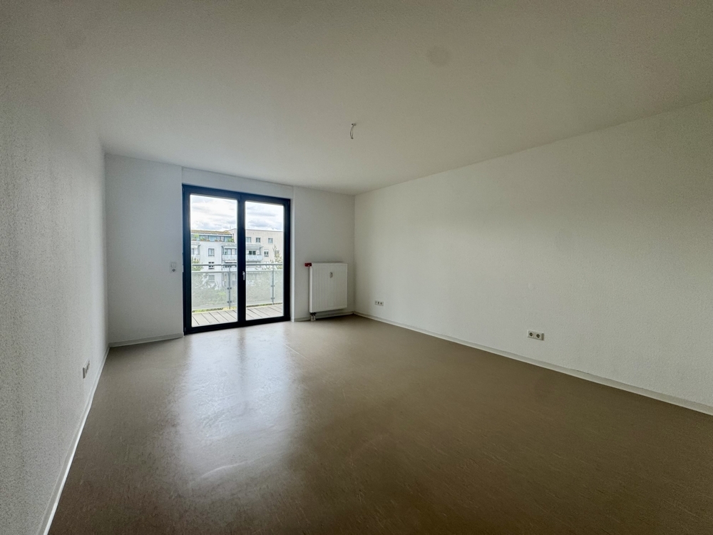 Sonnenhelle 2 Zi.-Wohnung mit Tageslichtbad plus Stellplatz mit Wallbox! - Photo 1