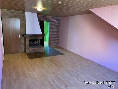 Wohnzimmer mit Kamin