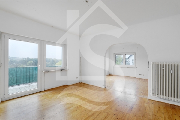 Wohnzimmer mit Balkon OG-Wohnung