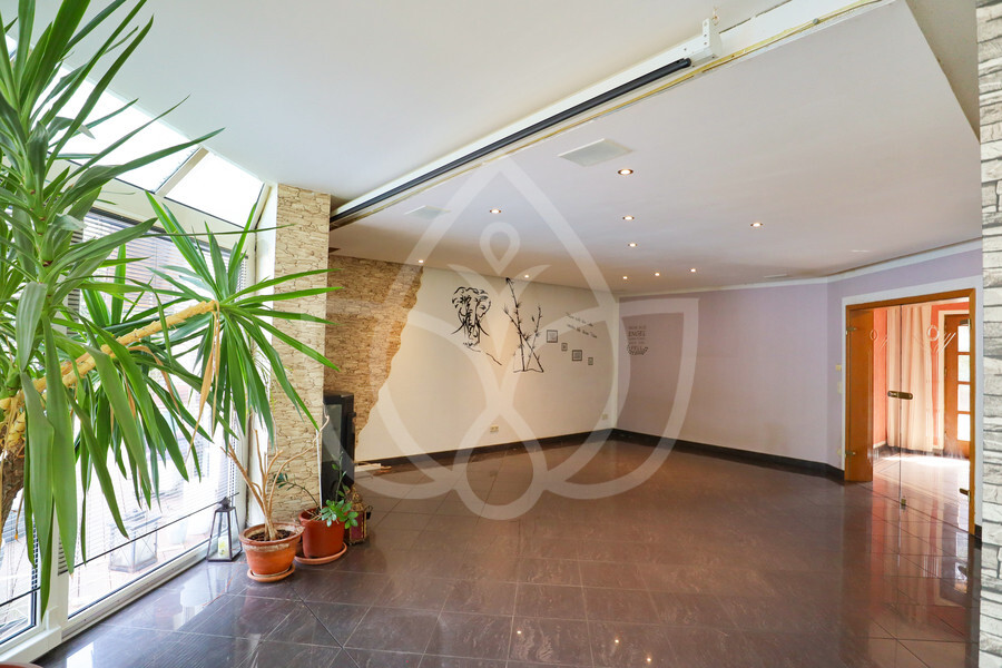 EG - Wohnbereich mit Wintergarten & Kamin