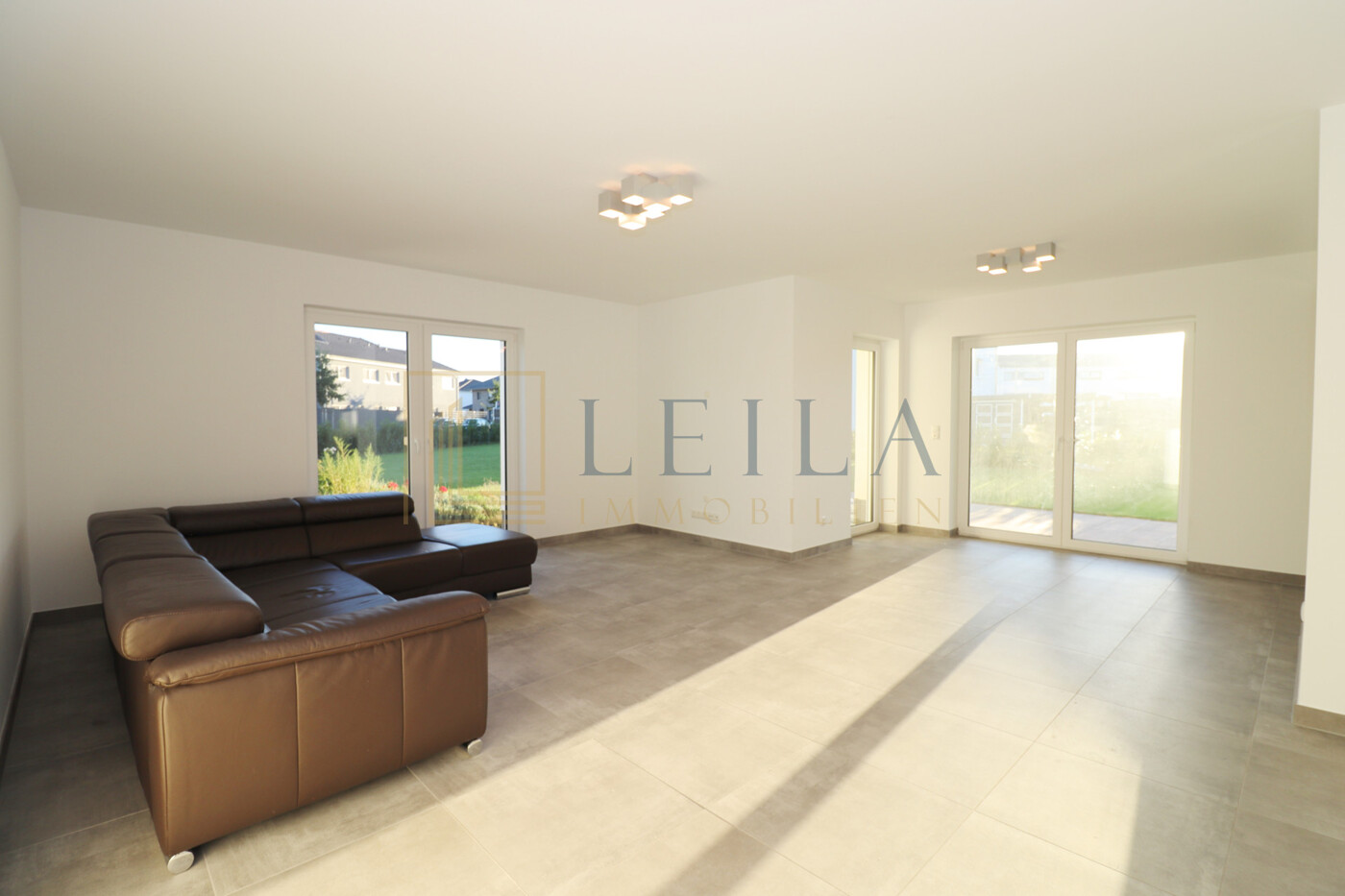 LEILA Immobilien - 9e3c8b6a 3a88 4667 8242 ebf0d9475f02 Wohnzimmer