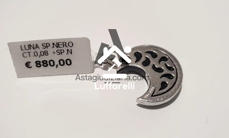 Preziosi – un ciondolo a forma di luna in oro bianco 18 kt con pietra nera… — foto 2