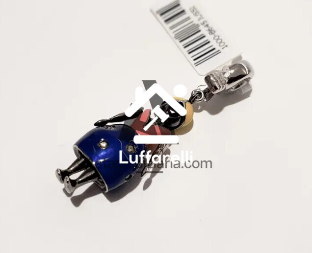 Preziosi – un charm a forma di bambola in oro bianco 18 kt e smalti giallo… — foto 2
