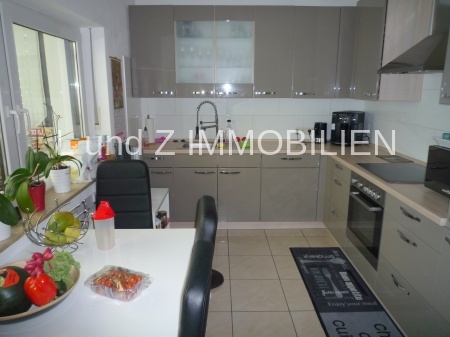 Luxus pur: Wunderschöne 3-Zimmer-Wohnung mit überdachtem Wintergarten und Garage. - Foto 1