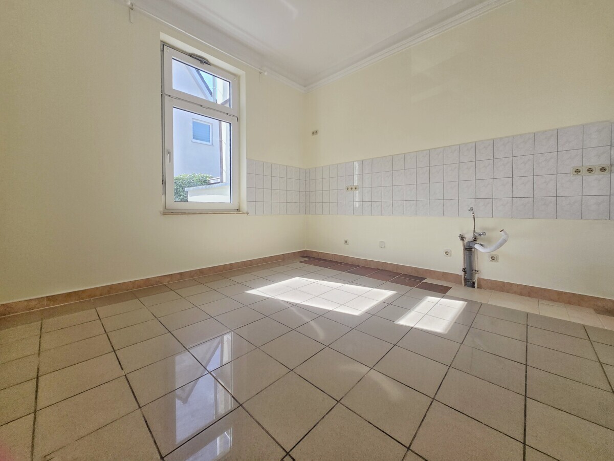 Erdgeschosswohnung mit Altbau-Charme und Terrasse in zentraler Lage von Rastede - Photo 4