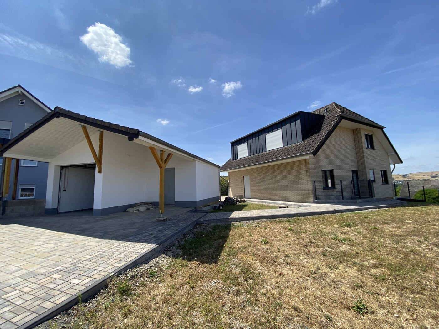 Frontansicht WE 1 | Garage | externer Heizungsraum