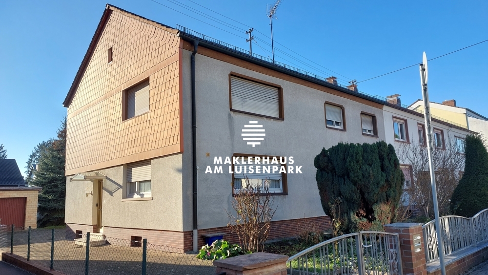 Einseitig angebautes Zweifamilienhaus mit ELW im Herzen von Eppelheim auf sonnigem Grundstück