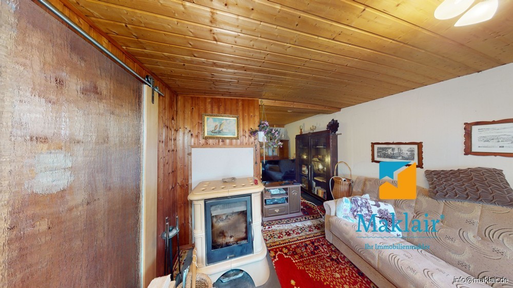 Wohnzimmer mit Kamin