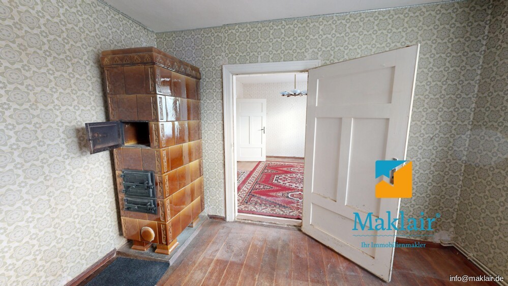 Zimmer mit Kachelofen