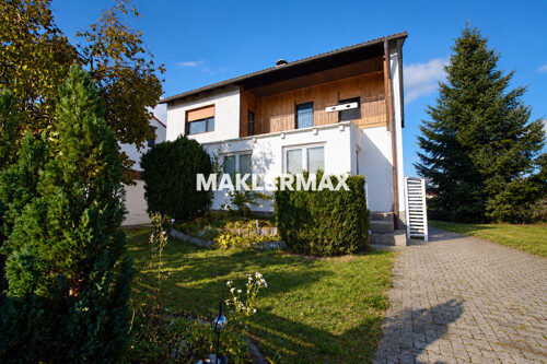 Haus mit Garten und Auffahrt