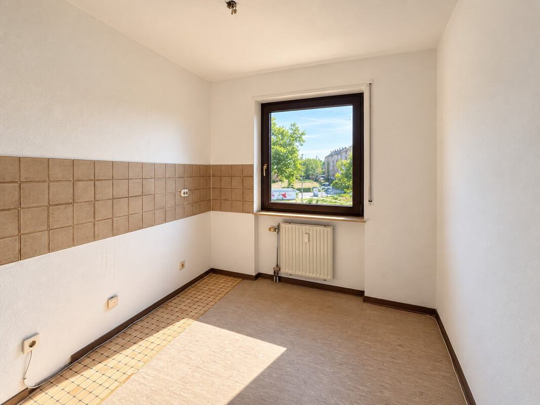 Gut geschnittene 2-Zimmer-Wohnung
mit Balkon und Tiefgaragenstellplatz – Bild 4