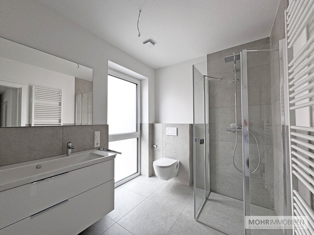 Erstbezug: Großzügige 4-Zimmer-WHG im Herzen von Sandkrug - Photo 2