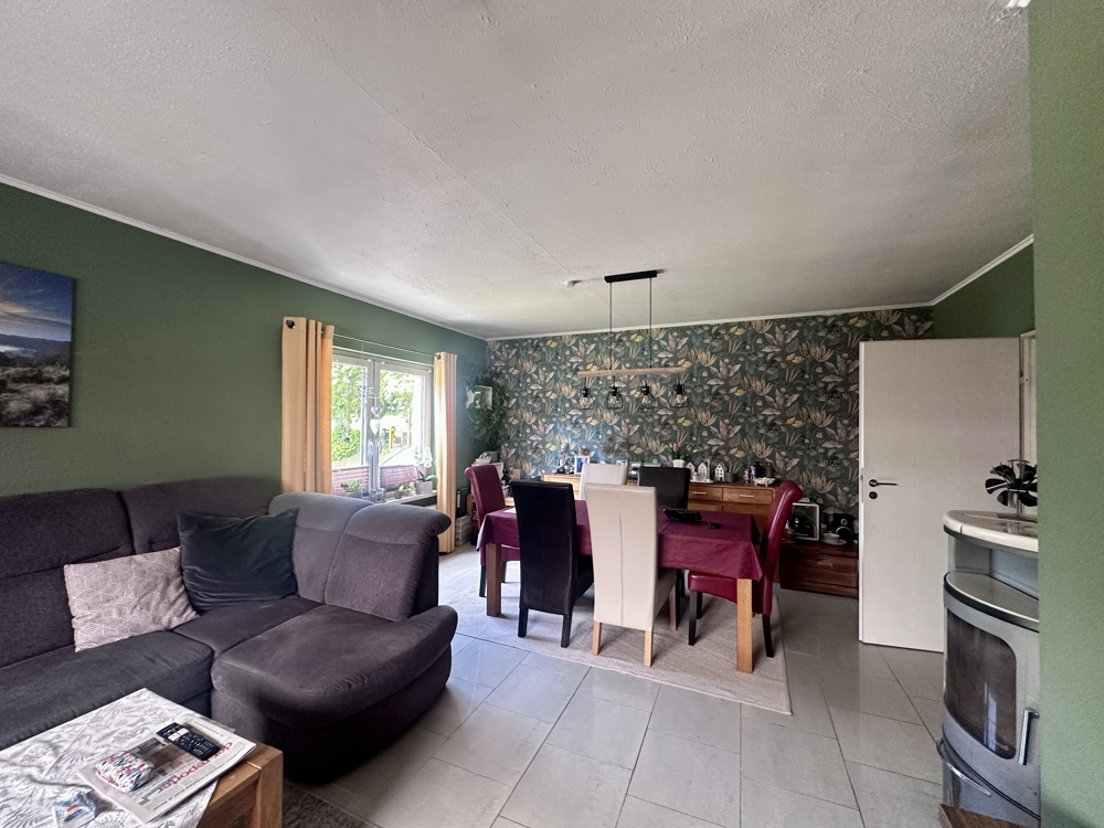 WE 1 - Wohn- und Esszimmer mit Kaminofen