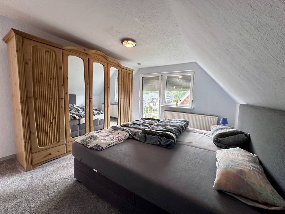 Schlafzimmer mit Balkon
