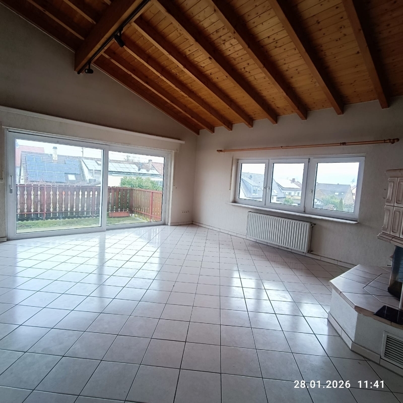 Wohnzimmer mit Kamin