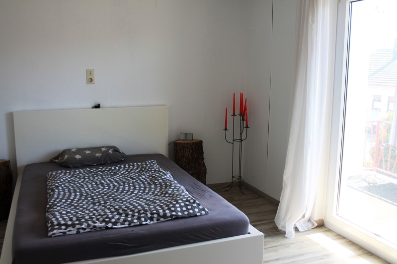 Schlafzimmer mit Balkon