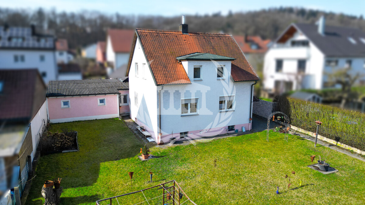 Zwei Häuser, ein Grundstück – Kapitalanlage & Neubaupotenzial in Pielmühle!