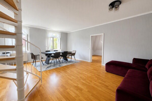 Immobiliensuche Detail View | Image Name - Image Alt Wohn- und Esszimmer - KI generiert