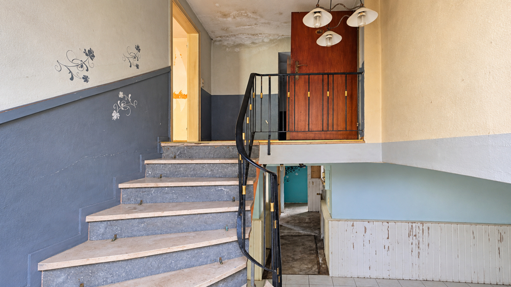 Treppenhaus mit Zugang zu den weiteren Räumen