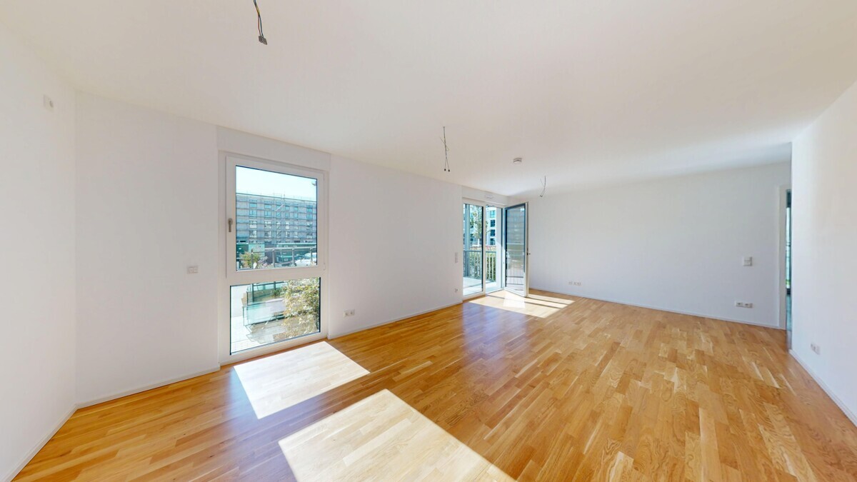 Neubau-Erstbezug: Attraktive Wohnung mit sonnigem Balkon und Erdgeschossterrasse! - Foto 2