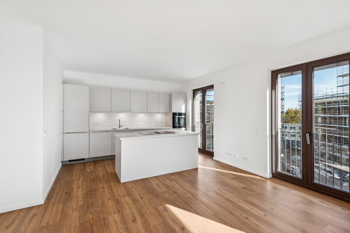 Ansprechende Neubauwohnung mit Einbauküche, 4 Schlafzimmern und Bad en Suite! - Foto 2