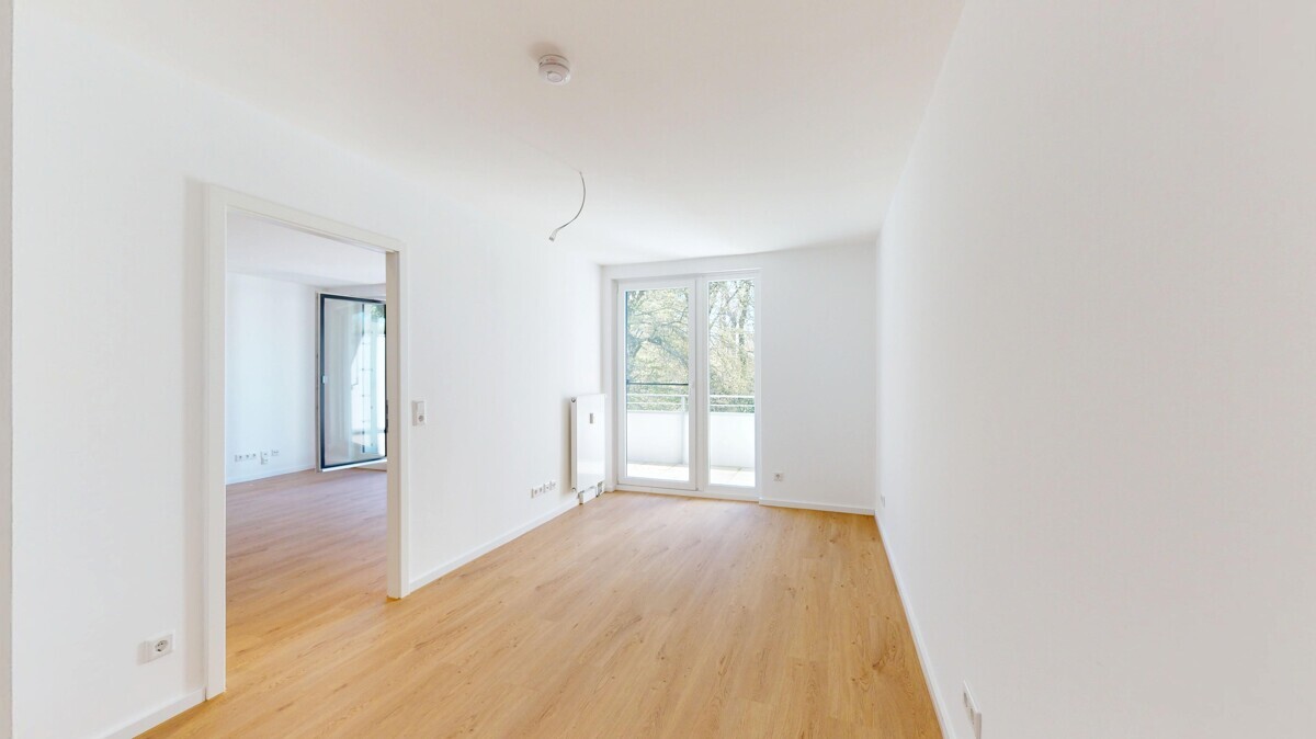 Erstbezug nach Kernsanierung: Charmante Wohnung mit ansprechender Einbauküche und Grünblick! - Foto 2