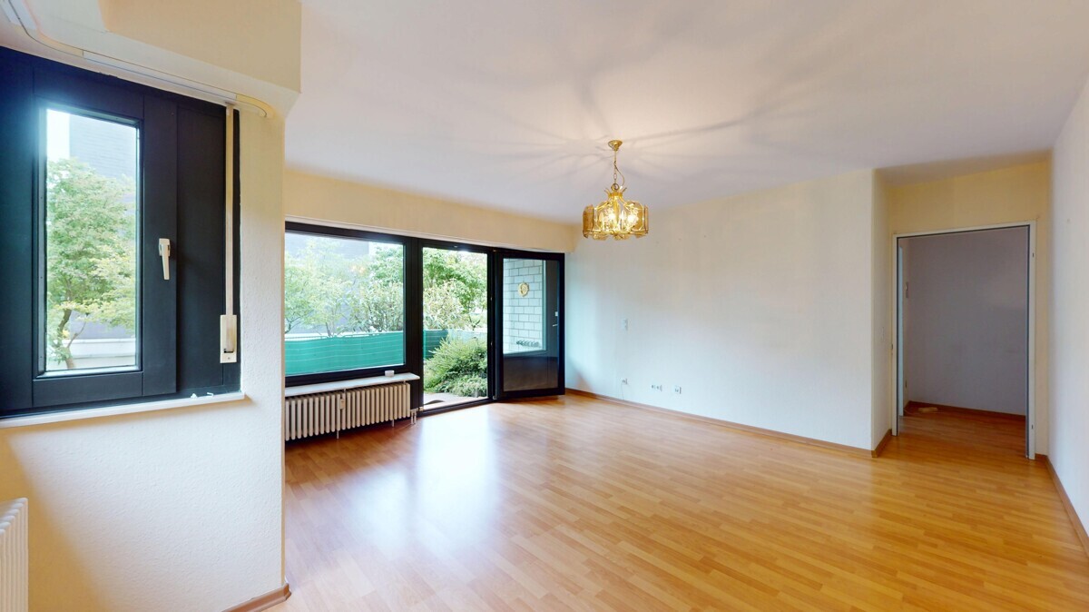 Unterrath: Gut geschnittene Wohnung mit Süd-Terrasse und Tiefgaragenstellplatz! - Foto 2