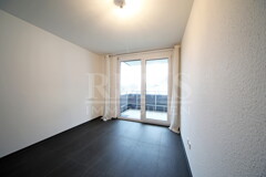 Schlafzimmer mit Balkonzugang