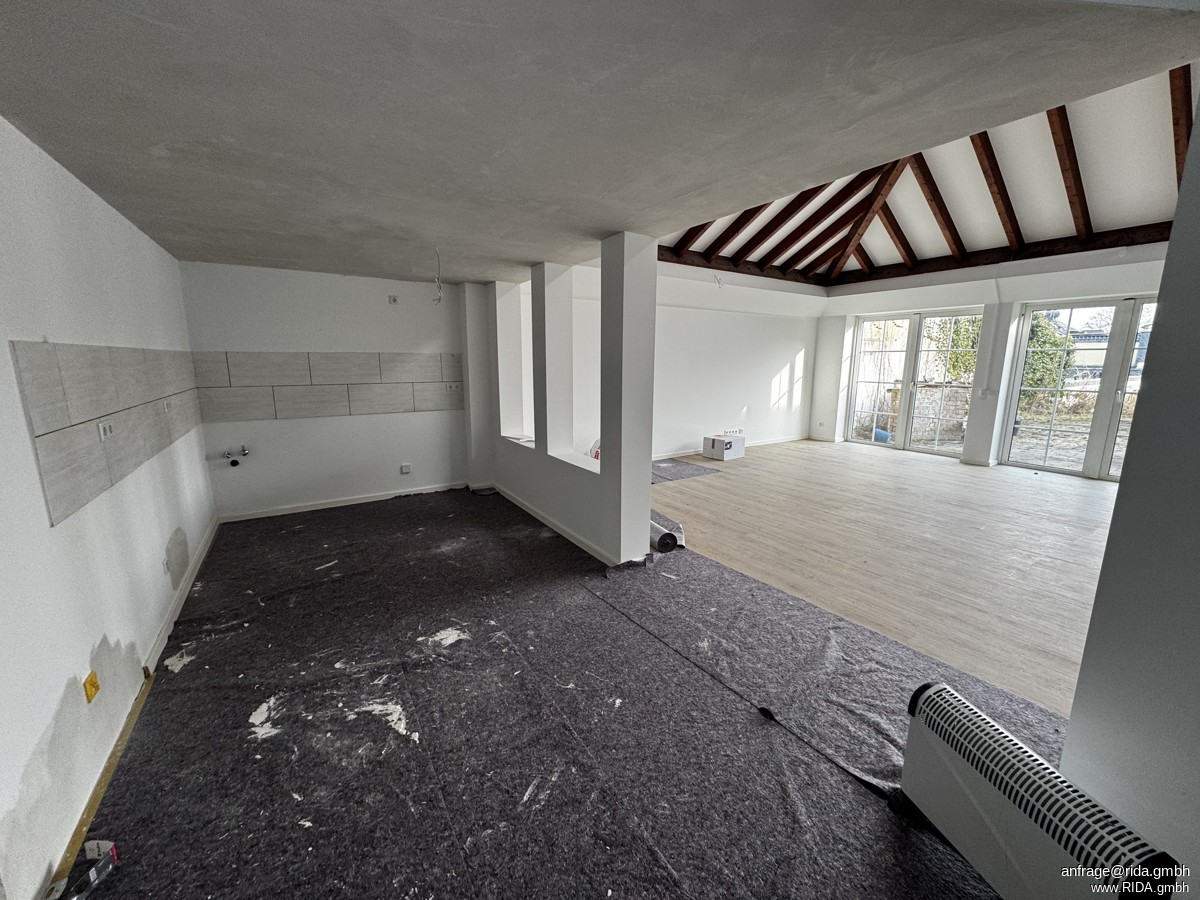 RIDA FLATS - Moderne Erdgeschosswohnung mit großzügigem Wohnbereich und Gartenblick - Photo 2