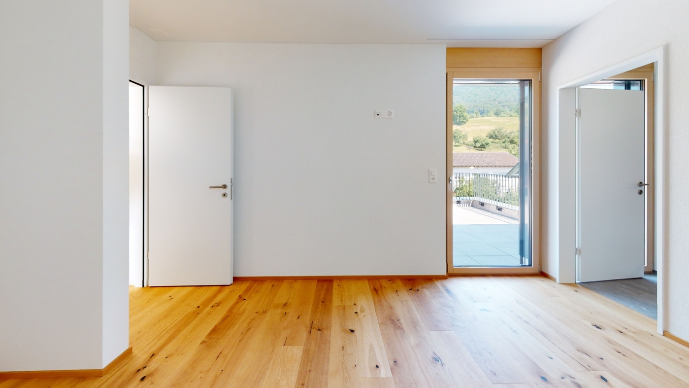 Elternschlafzimmer mit direktem Zugang zur Terrasse und eigenem Badezimmer