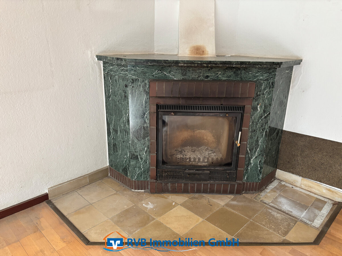 WE I: Kamin im Wohnzimmer
