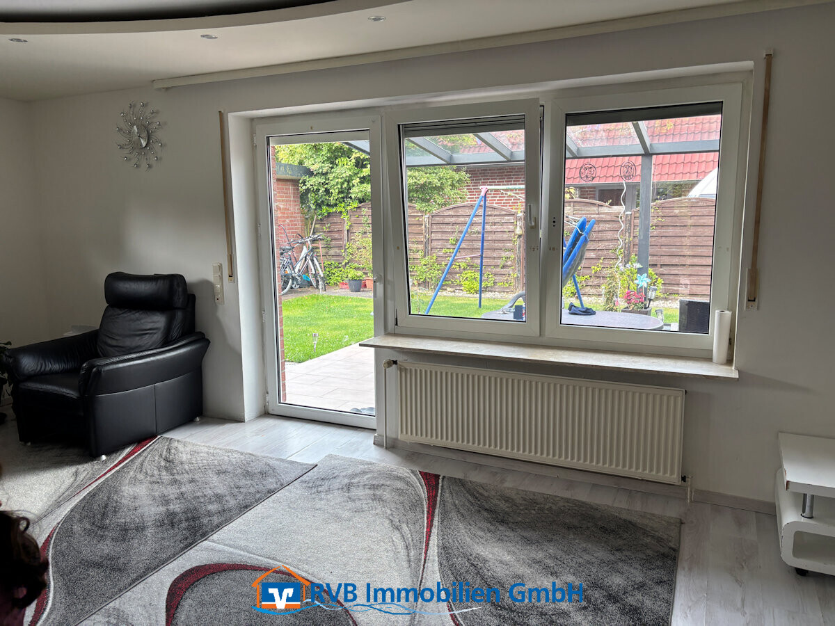 Wohnzimmer mit Gartenzugang