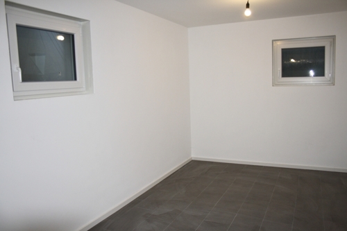 Gefliester Hobbyraum/ Keller