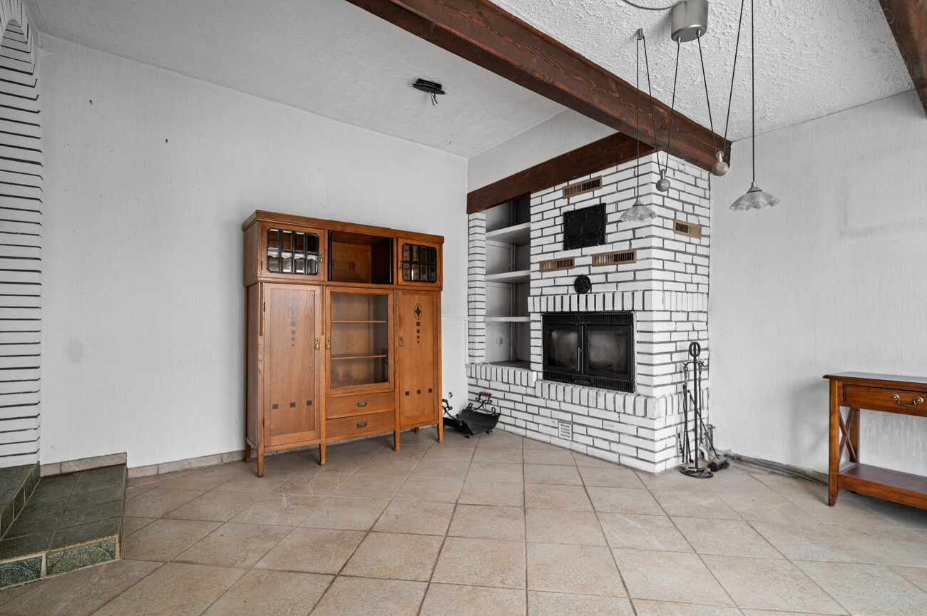 Wohnzimmer mit Kamin