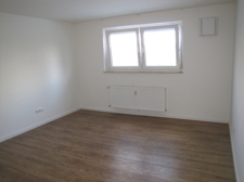 Das Wohn- und Schlafzimmer