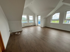 Das Wohnzimmer mit Balkon