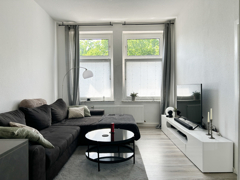 NEU zum Verkauf in Bochum Wattenscheid - Wohnzimmer 2. OG - Reuter Immobilien – Immobilienmakler