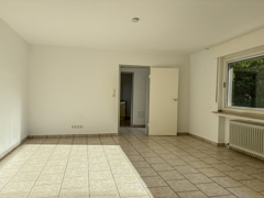 NEU zum Verkauf in Bochum Stiepel - Einfamilienhaus - ELW Wohnzimmer - Reuter Immobilien – Immobilienmakler