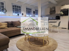 NEU zur Vermietung in Herne Wanne-Eickel - Wohnzimmer mit Kochbereich - Reuter Immobilien – Immobilienmakler