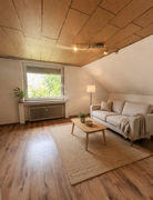 NEU zur Vermietung in Herne Mitte - Wohnzimmer - Reuter Immobilien – Immobilienmakler.png (2)
