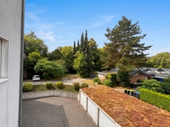 NEU zum Verkauf in Herne-Eickel  -  Eigentumswohnung - Blick vom Balkon- Reuter Immobilien – Immobilienmakler - KI-generiert