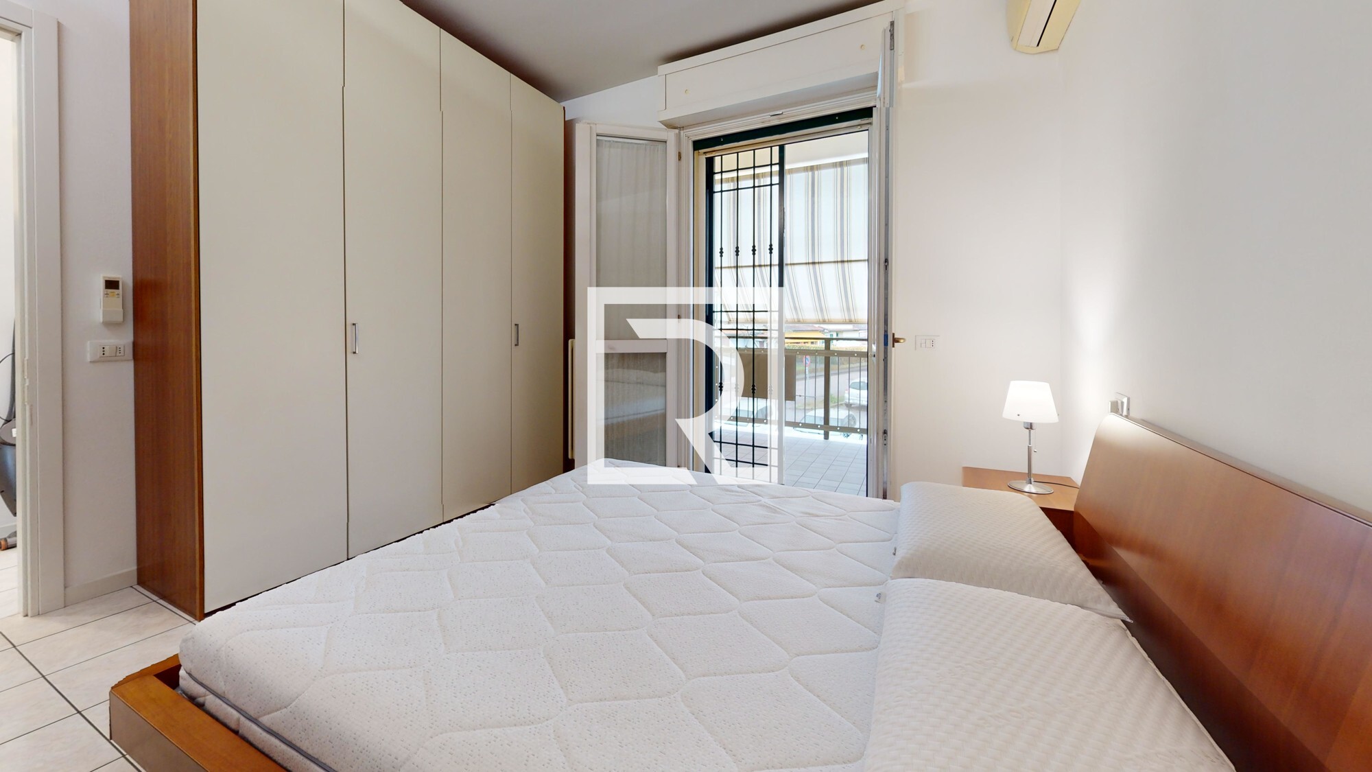 bilocale-con-cantina-e-posto-auto-Bedroom 1