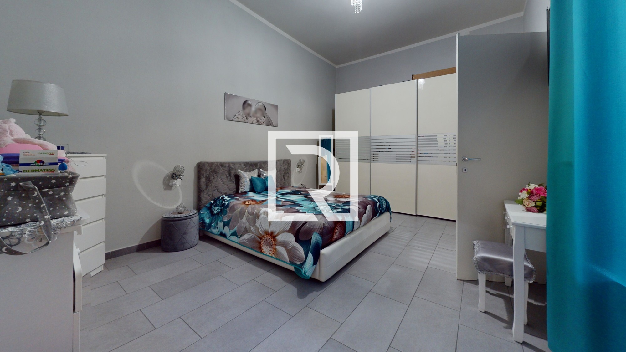 trilocale-finemente-ristrutturato-Bedroom 1