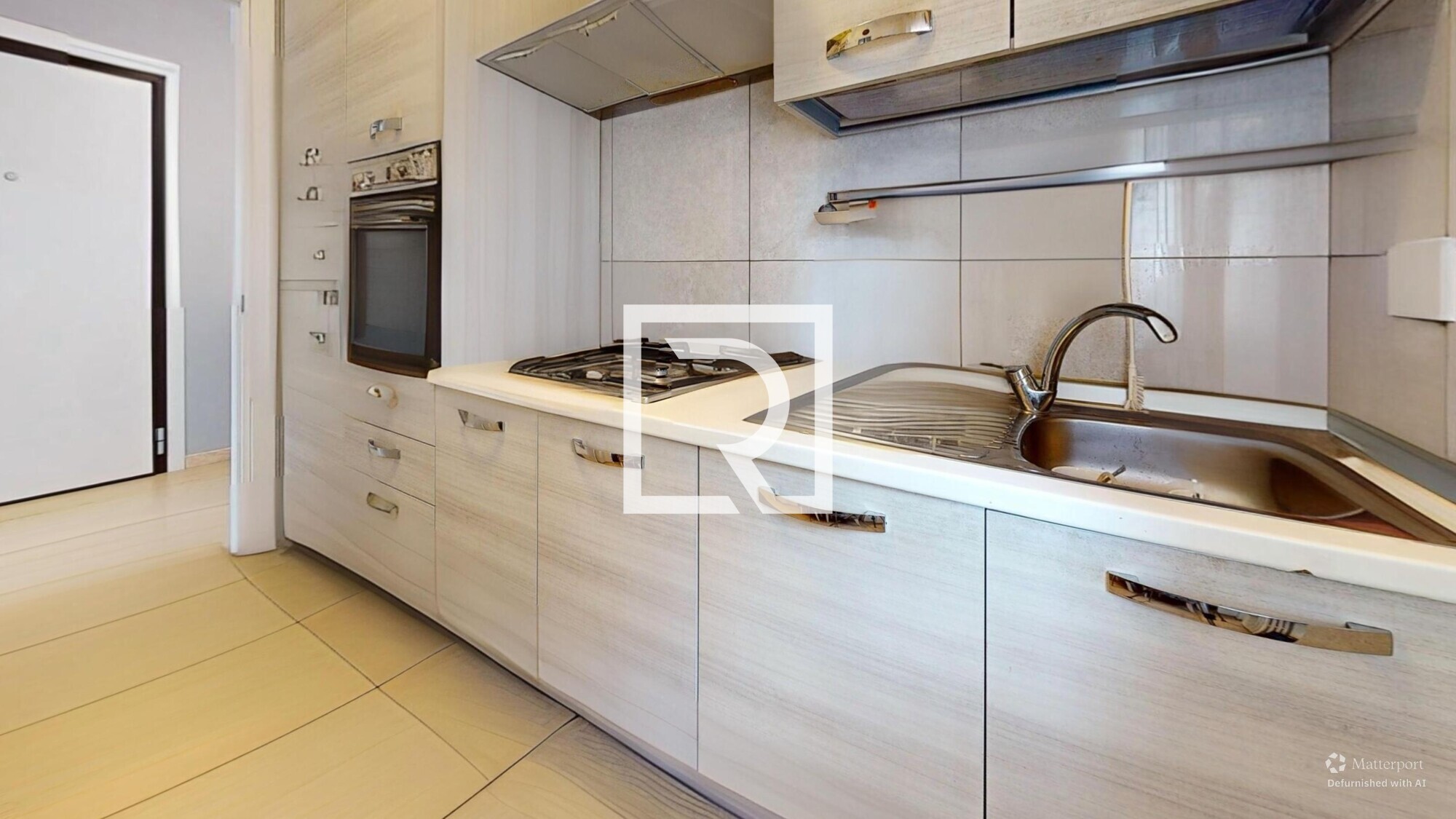 TRILOCALE-PIANO-PRIMO-CON-CANTINA-E-GARAGE-Kitchen-Defurnished