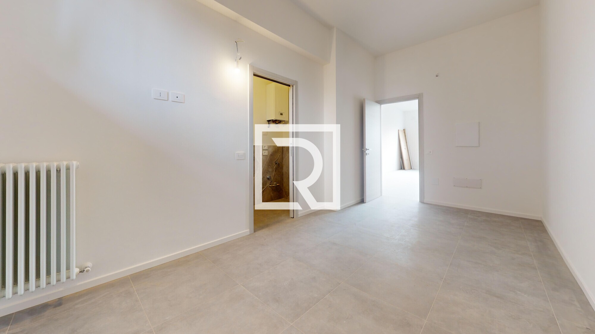 Bilocale-Al-Piano-Terra-Bedroom 1