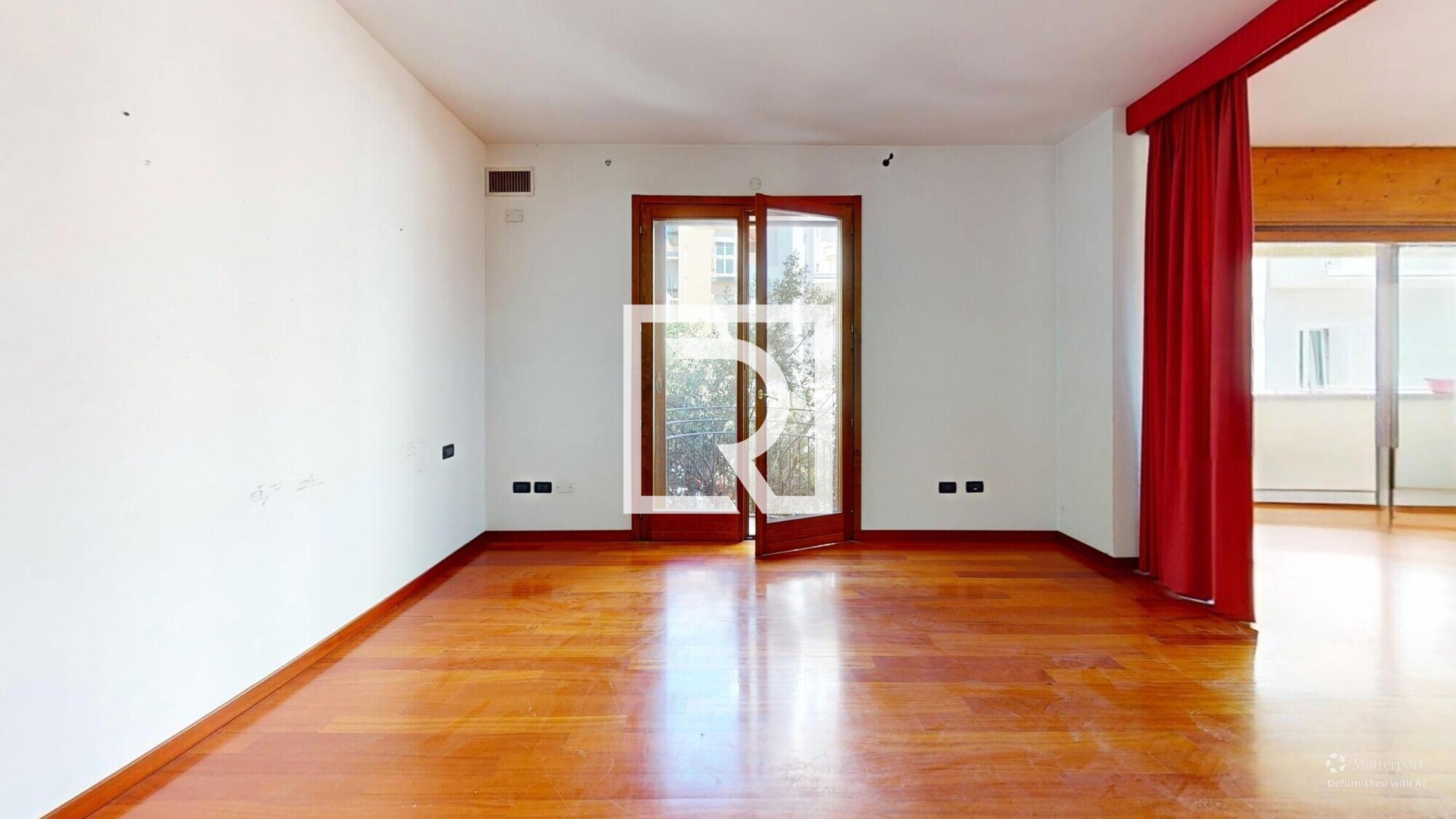 Via-Agordat-Living-Room-Defurnished 8