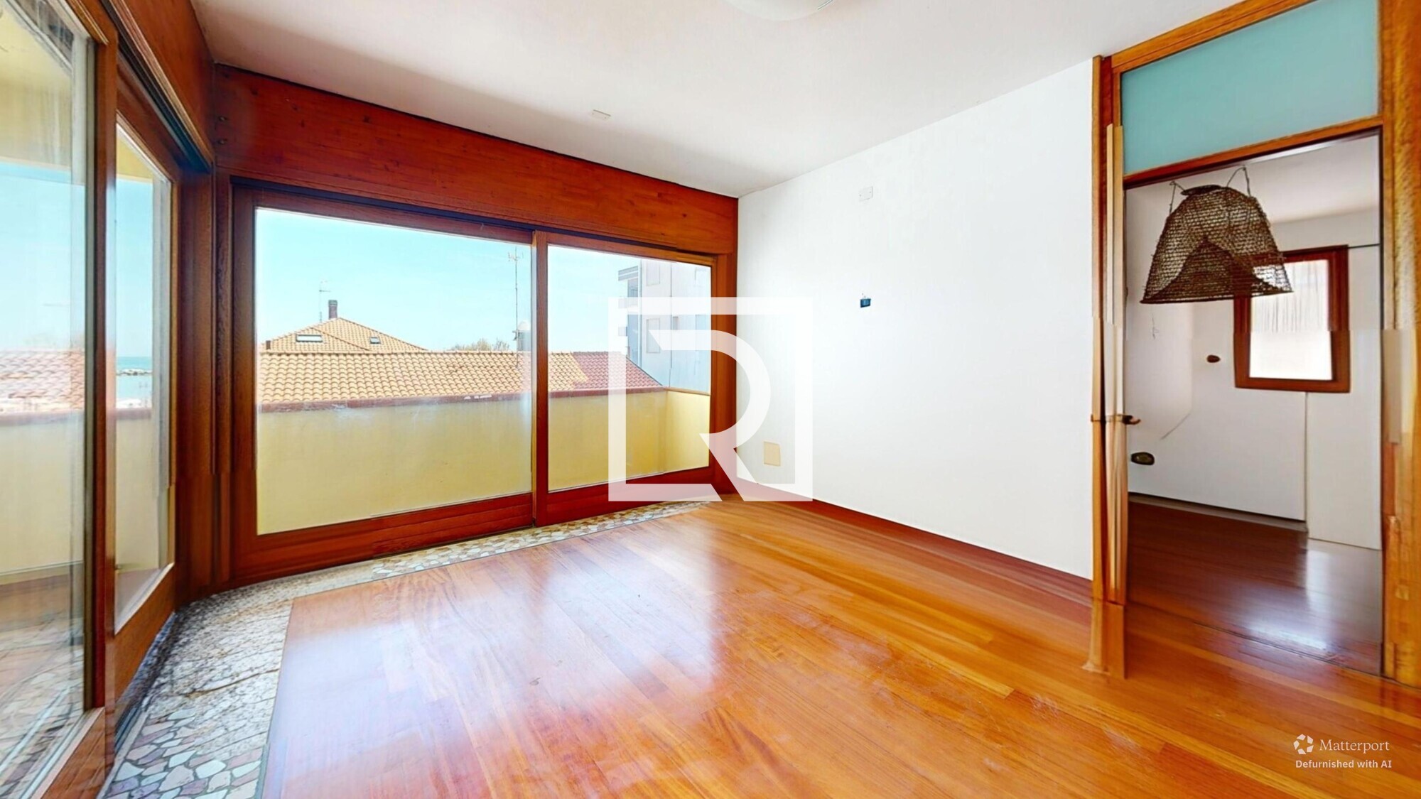 Via-Agordat-Living-Room-Defurnished 2
