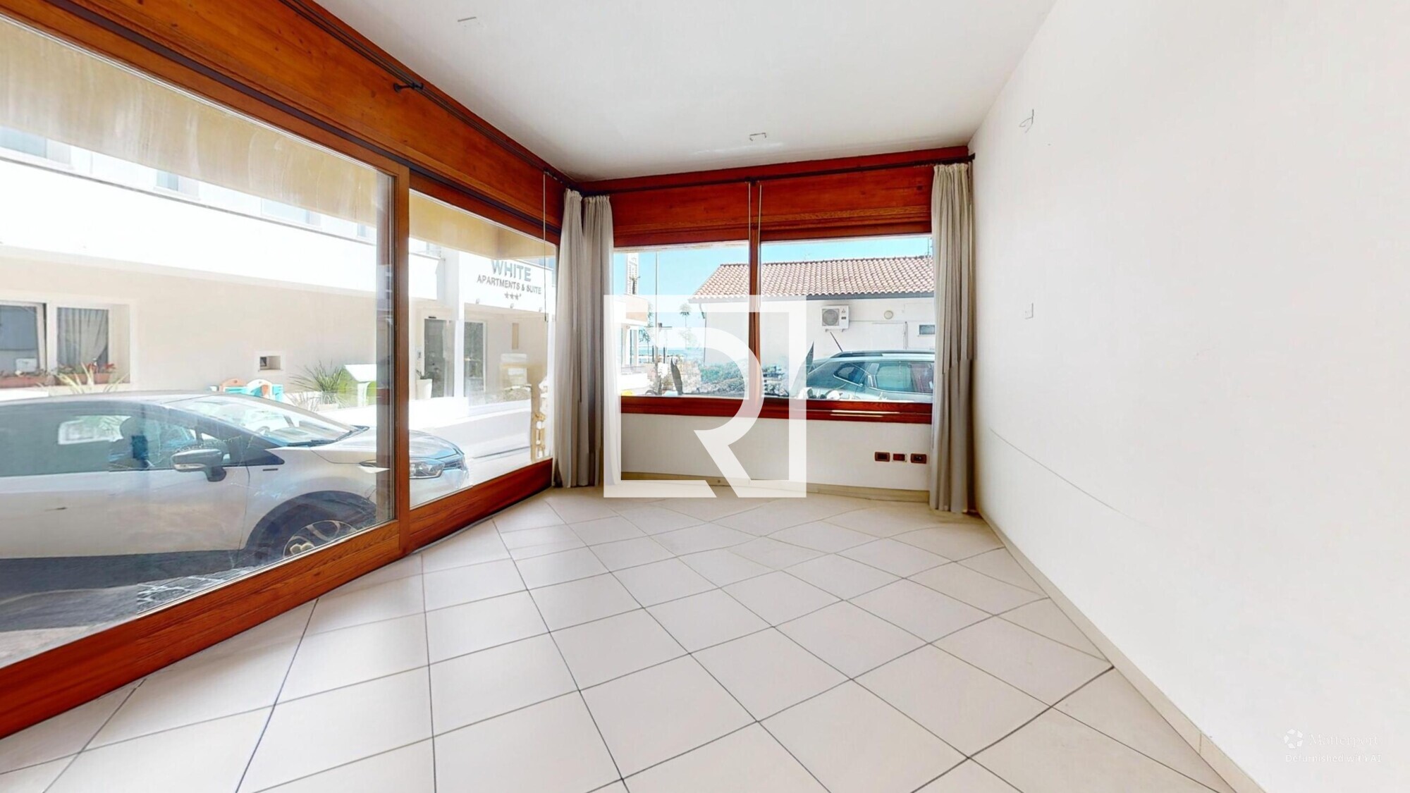 Via-Agordat-Living-Room-Defurnished 4