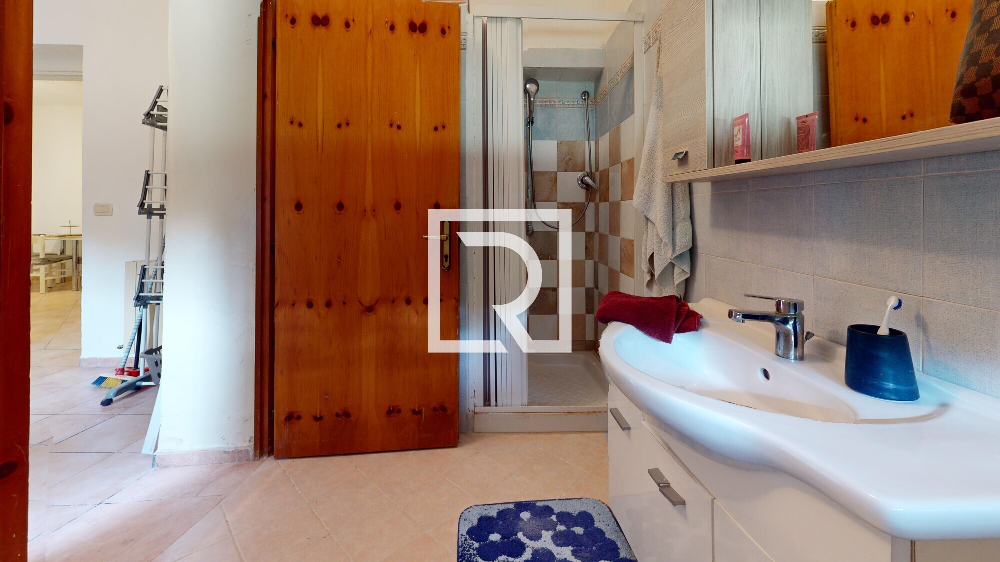 Appartamento-quadrilocale-piano-terra-con-giardino-separato-Bathroom 1